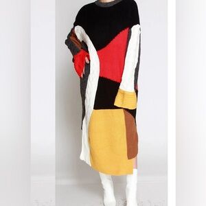 Color Block Ribbed Sweater Dress. 65% cotton and 35% polyester.
